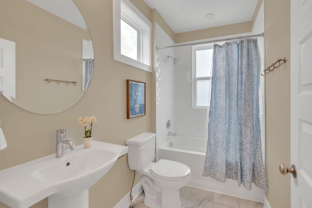 500 Creative Way Unit 16, Madison, TN 37115 - full bathroom with toilet, shower / bath combination with curtain, marble finish floors, baseboards, and a sink