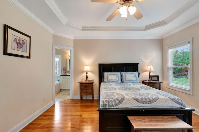 2710 Maylon Dr, Murfreesboro, TN 37128 - bedroom featuring a raised ceiling, light wood-type flooring, crown molding, and ensuite bathroom