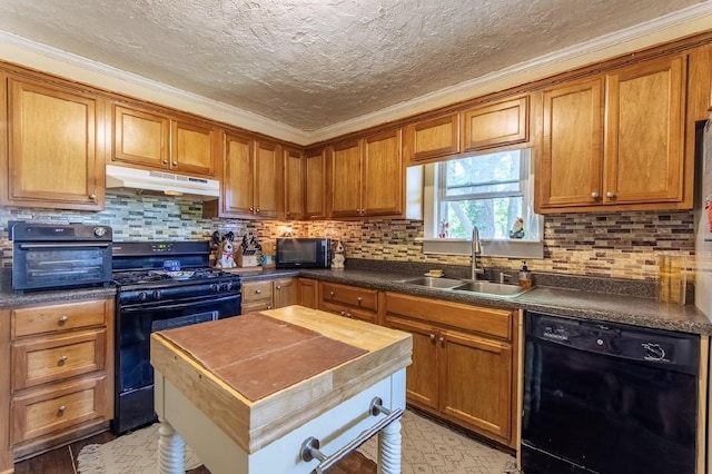 155 Thomas St, Savannah, TN 38372 - kitchen with black appliances, under cabinet range hood, a sink, brown cabinets, and ornamental molding