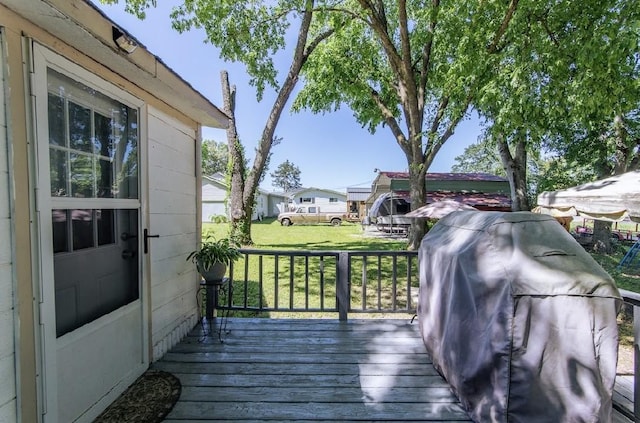 155 Thomas St, Savannah, TN 38372 - wooden terrace featuring a grill and a yard