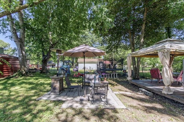 155 Thomas St, Savannah, TN 38372 - view of yard with a gazebo, a patio area, and a wooden deck
