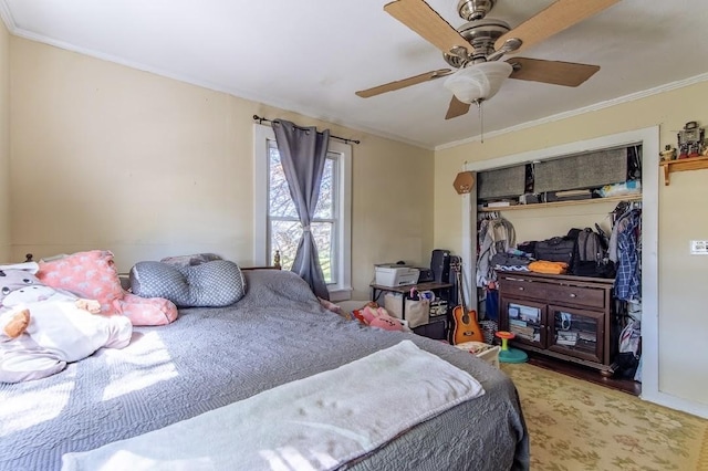 155 Thomas St, Savannah, TN 38372 - bedroom with crown molding, a closet, and a ceiling fan
