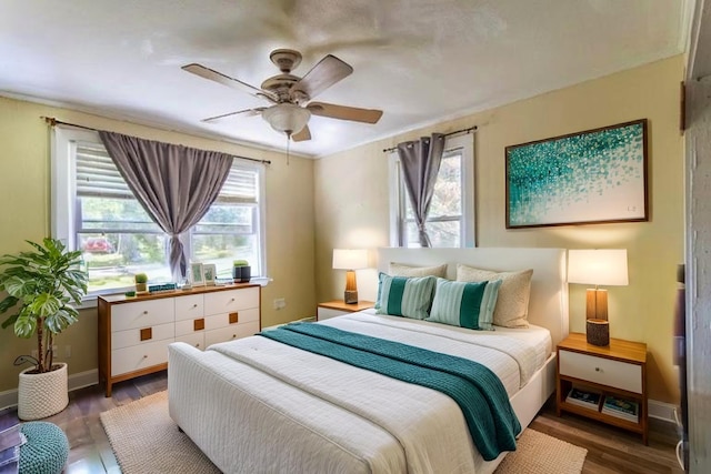 155 Thomas St, Savannah, TN 38372 - bedroom with wood finished floors, baseboards, and a ceiling fan