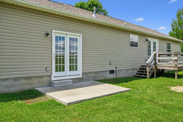 710 Krissy Ct, Columbia, TN 38401 - back of property with a wooden deck, a lawn, crawl space, roof with shingles, and a patio