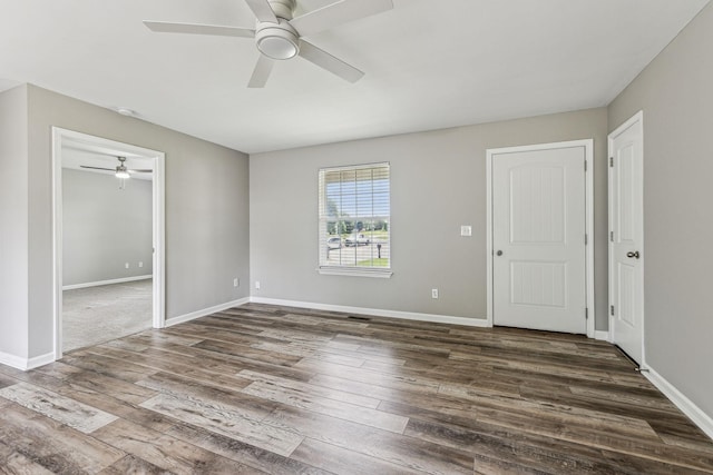 710 Krissy Ct, Columbia, TN 38401 - spare room featuring ceiling fan, dark wood-type flooring, and baseboards