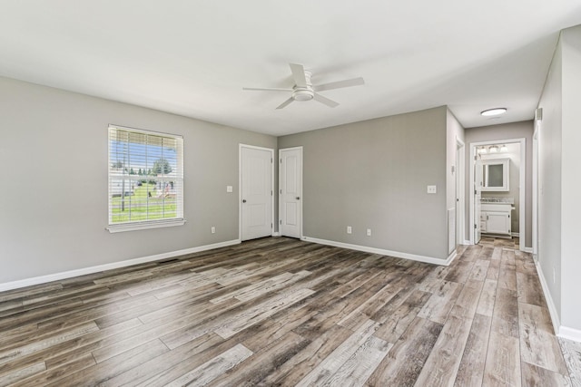710 Krissy Ct, Columbia, TN 38401 - spare room with a ceiling fan, wood finished floors, and baseboards
