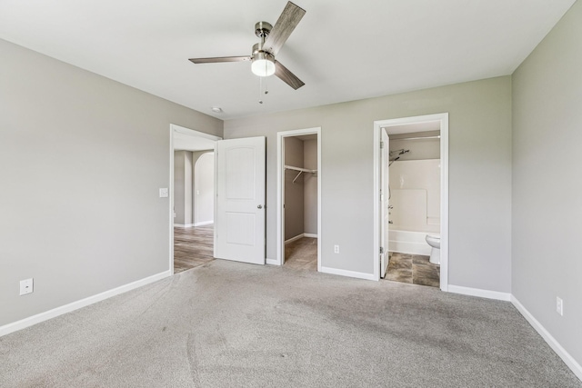710 Krissy Ct, Columbia, TN 38401 - unfurnished bedroom with carpet floors, a spacious closet, baseboards, and a closet