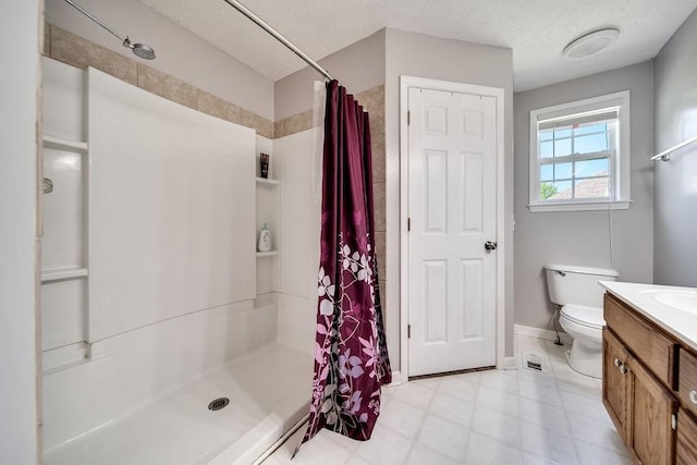 152 Cody Ct, Portland, TN 37148 - full bathroom featuring a shower stall, vanity, toilet, a textured ceiling, and baseboards