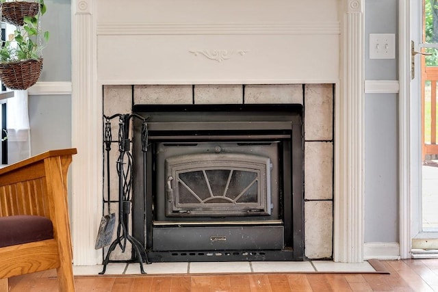 152 Cody Ct, Portland, TN 37148 - detailed view of wood finished floors and a wood stove