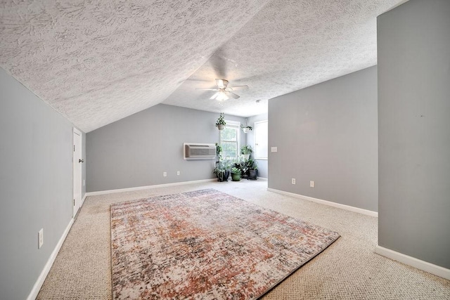 152 Cody Ct, Portland, TN 37148 - bonus room featuring ceiling fan, carpet, an AC wall unit, baseboards, and a textured ceiling
