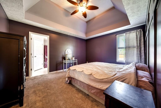 152 Cody Ct, Portland, TN 37148 - carpeted bedroom with a tray ceiling, baseboards, and a ceiling fan