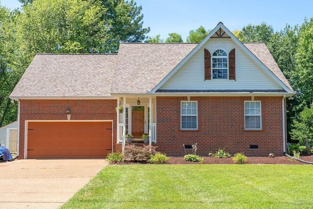 152 Cody Ct, Portland, TN 37148 - view of front of home with an attached garage, driveway, a front lawn, brick siding, and a shingled roof