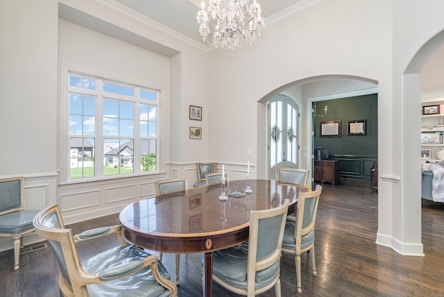 2036 Bocage Cir, Nolensville, TN 37135 - dining room featuring arched walkways, a decorative wall, french doors, ornamental molding, and dark wood-style flooring