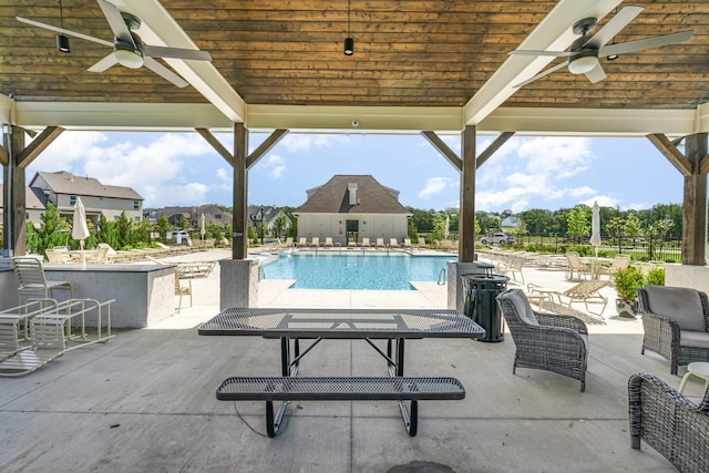 2036 Bocage Cir, Nolensville, TN 37135 - community pool with a ceiling fan, a patio area, and an outbuilding