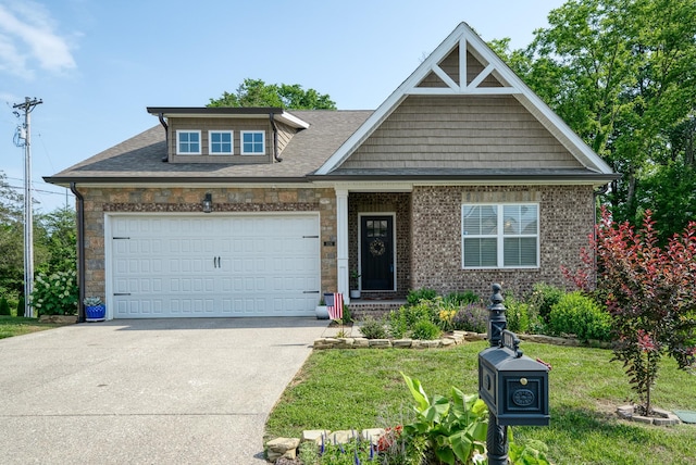 1124 Cross Pointe Dr, Cookeville, TN 38506 - craftsman inspired home with an attached garage, driveway, a front yard, and a shingled roof