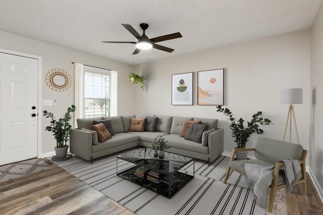 2640 Queen Anne Ct, Springfield, TN 37172 - living area with wood finished floors, ceiling fan, and baseboards