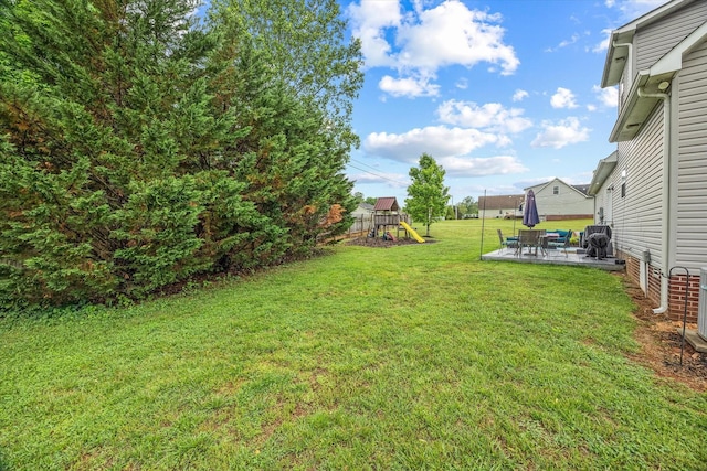 1531 Lake Villa Cir, Cookeville, TN 38506 - view of green lawn featuring a playground and a patio area