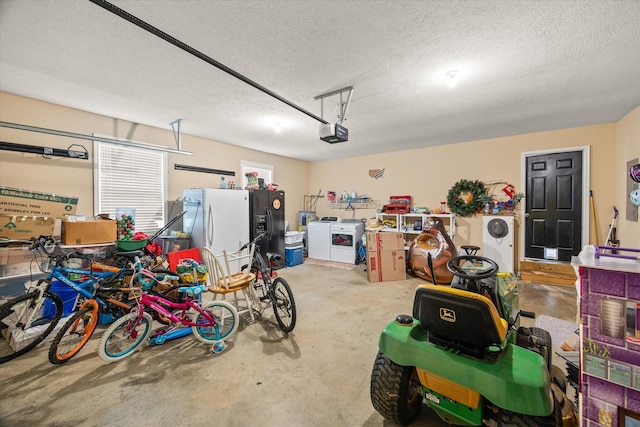 1531 Lake Villa Cir, Cookeville, TN 38506 - garage with a garage door opener, white refrigerator with ice dispenser, and separate washer and dryer
