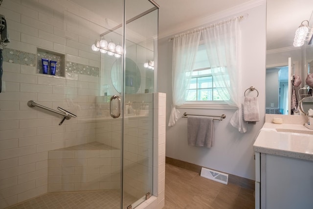 1448 Baker Ln, Lawrenceburg, TN 38464 - bathroom featuring ornamental molding, vanity, and a stall shower