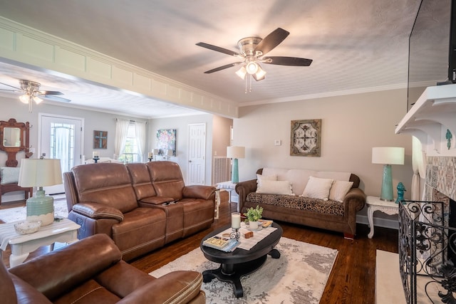 1448 Baker Ln, Lawrenceburg, TN 38464 - living room with a ceiling fan, dark wood finished floors, ornamental molding, and a fireplace