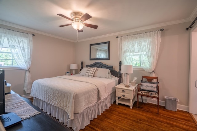 1448 Baker Ln, Lawrenceburg, TN 38464 - bedroom with multiple windows, wood finished floors, ornamental molding, ceiling fan, and baseboards