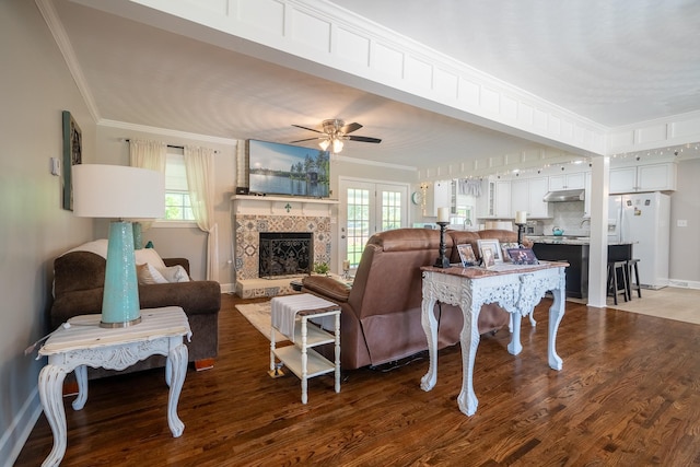 1448 Baker Ln, Lawrenceburg, TN 38464 - living room with wood finished floors, plenty of natural light, a ceiling fan, ornamental molding, and baseboards