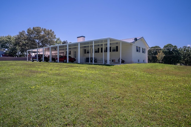1448 Baker Ln, Lawrenceburg, TN 38464 - rear view of house with a yard and a chimney