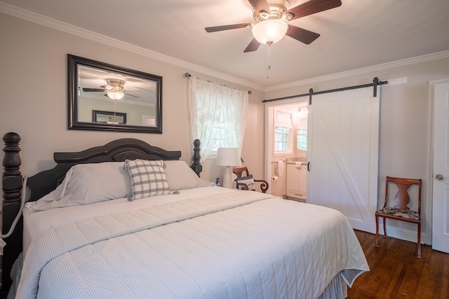 1448 Baker Ln, Lawrenceburg, TN 38464 - bedroom featuring dark wood-type flooring, ornamental molding, a barn door, a ceiling fan, and ensuite bathroom