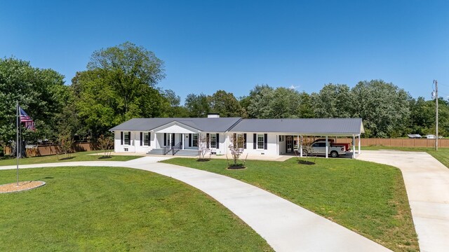 1448 Baker Ln, Lawrenceburg, TN 38464 - ranch-style house featuring concrete driveway, a carport, and covered porch