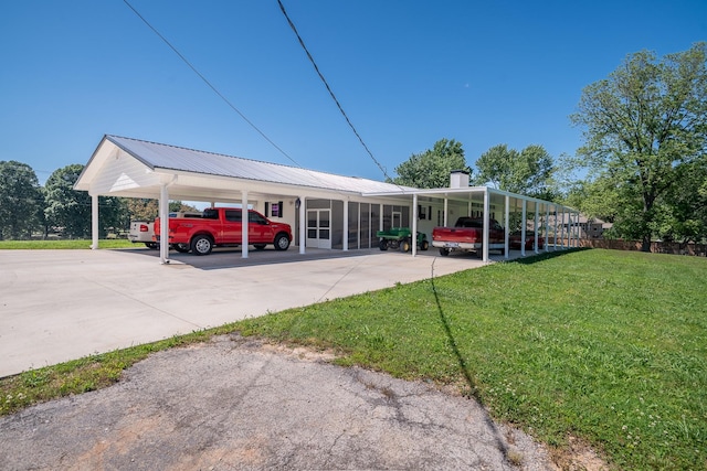 1448 Baker Ln, Lawrenceburg, TN 38464 - view of parking with driveway and an attached carport