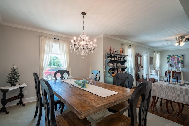 1448 Baker Ln, Lawrenceburg, TN 38464 - dining space featuring a chandelier, baseboards, ceiling fan, and crown molding