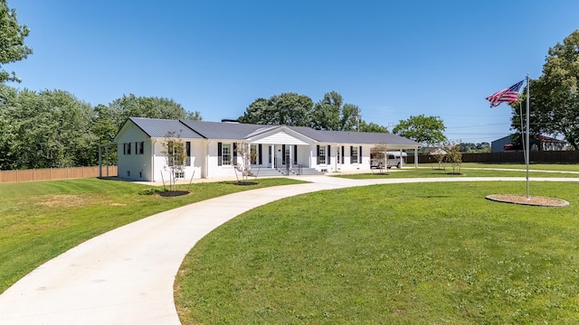 1448 Baker Ln, Lawrenceburg, TN 38464 - rear view of house featuring a porch, metal roof, and curved driveway