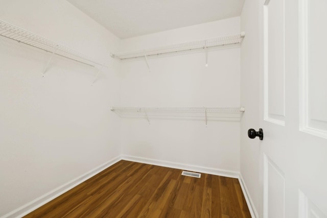 1075 Kathryn Rd, Mount Juliet, TN 37122 - spacious closet with dark wood-style floors