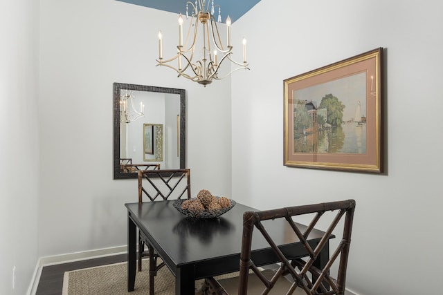 200 Manufacturers Rd Apt 241, Chattanooga, TN 37405 - dining area with a chandelier, baseboards, and wood finished floors