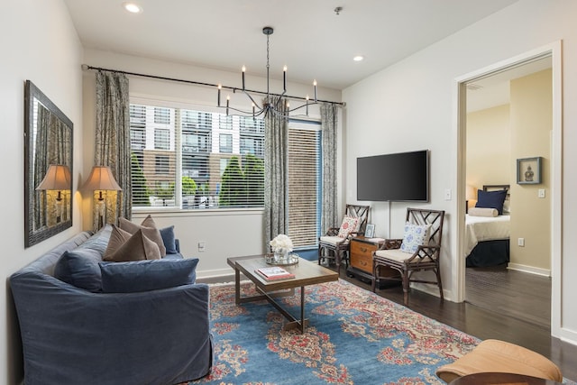 200 Manufacturers Rd Apt 241, Chattanooga, TN 37405 - living room featuring wood finished floors, a chandelier, baseboards, and recessed lighting