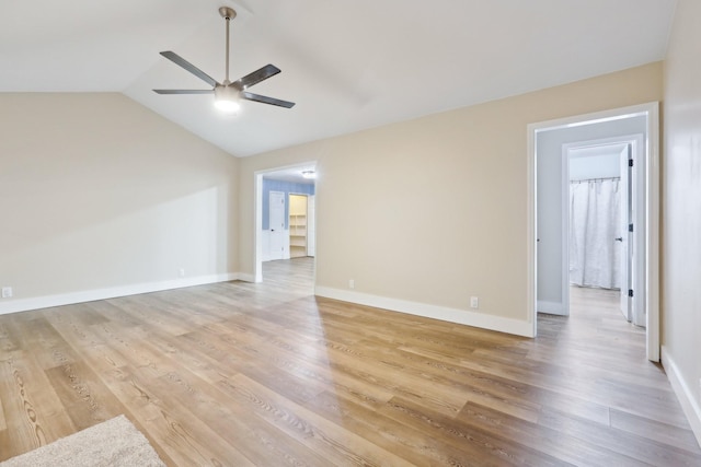 5430 Stacy Springs Rd, Springfield, TN 37172 - spare room featuring a ceiling fan, light wood-style floors, lofted ceiling, and baseboards