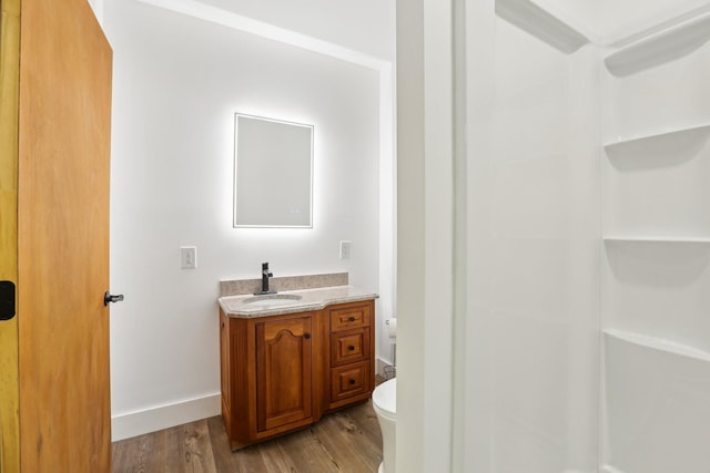 5430 Stacy Springs Rd, Springfield, TN 37172 - full bathroom featuring toilet, vanity, wood finished floors, and a shower
