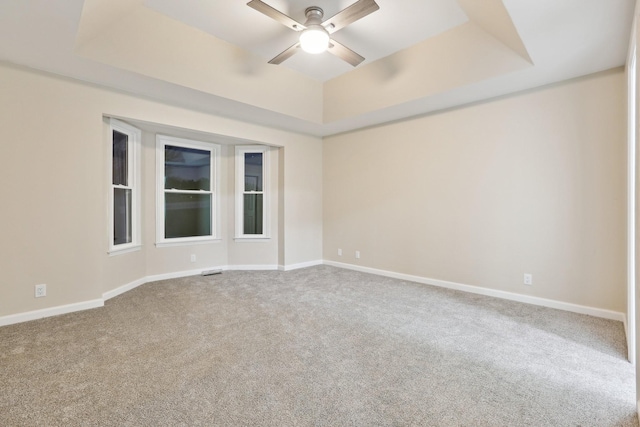 5430 Stacy Springs Rd, Springfield, TN 37172 - carpeted spare room featuring ceiling fan, baseboards, and a raised ceiling