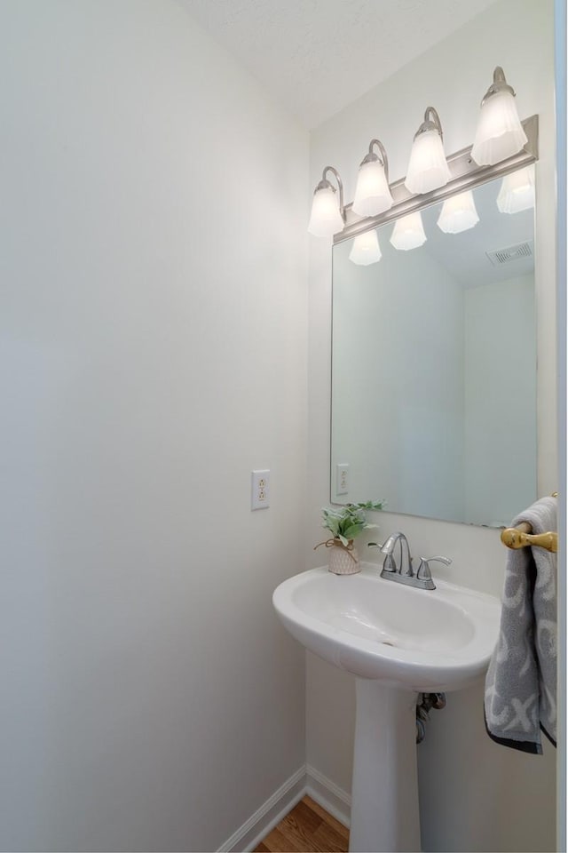 405 Parish Pl, Franklin, TN 37067 - bathroom featuring wood finished floors and baseboards