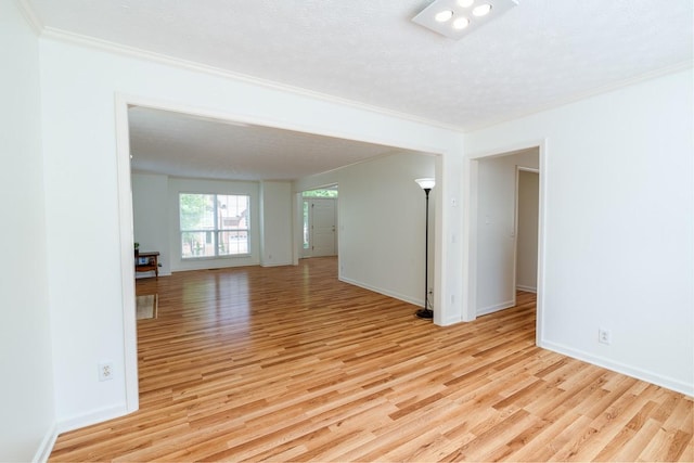 405 Parish Pl, Franklin, TN 37067 - spare room with light wood-style floors, ornamental molding, and baseboards