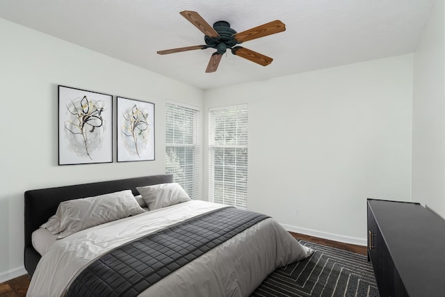 405 Parish Pl, Franklin, TN 37067 - bedroom featuring baseboards, dark wood-type flooring, and ceiling fan
