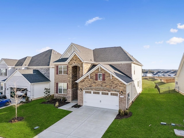 129 Willow Bend Dr, Mount Juliet, TN 37122 - traditional home with concrete driveway, an attached garage, brick siding, and stone siding