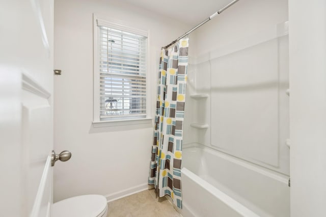 129 Willow Bend Dr, Mount Juliet, TN 37122 - bathroom featuring shower / tub combo with curtain, tile patterned flooring, toilet, and baseboards
