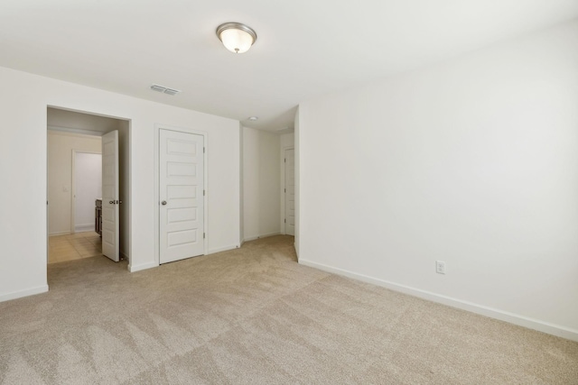 129 Willow Bend Dr, Mount Juliet, TN 37122 - unfurnished bedroom with light carpet, baseboards, and a closet