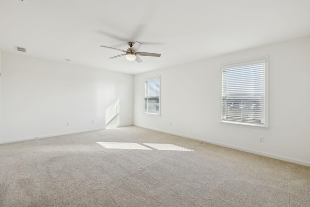129 Willow Bend Dr, Mount Juliet, TN 37122 - spare room featuring ceiling fan, light carpet, and baseboards