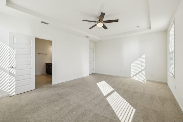 129 Willow Bend Dr, Mount Juliet, TN 37122 - carpeted empty room with a tray ceiling, ceiling fan, healthy amount of natural light, and baseboards