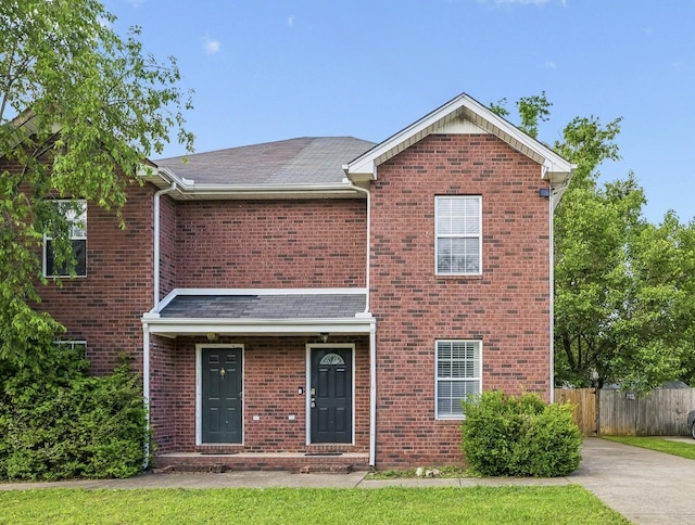 1625 Center Pointe Dr, Murfreesboro, TN 37130 - view of front of property with brick siding and a shingled roof