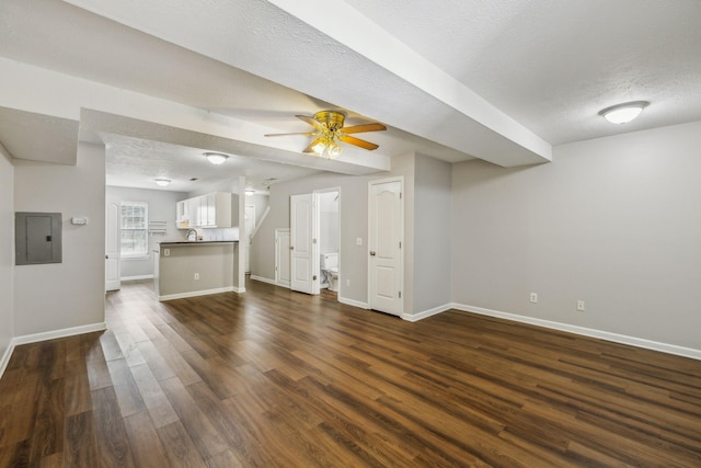 1625 Center Pointe Dr, Murfreesboro, TN 37130 - unfurnished living room with electric panel, dark wood-style floors, baseboards, a textured ceiling, and a ceiling fan