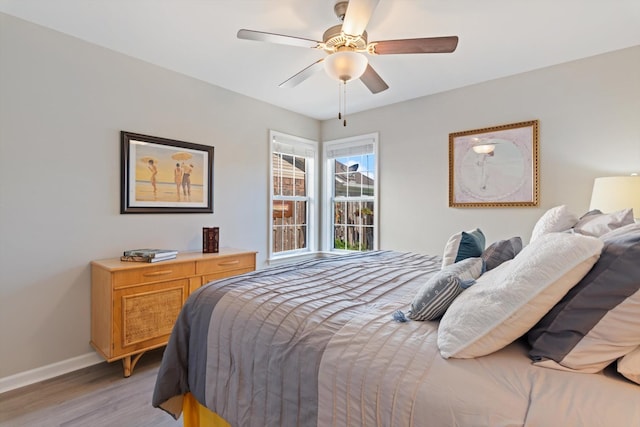 725 Forest Glen Cir, Murfreesboro, TN 37128 - bedroom with light wood-style flooring, baseboards, and a ceiling fan