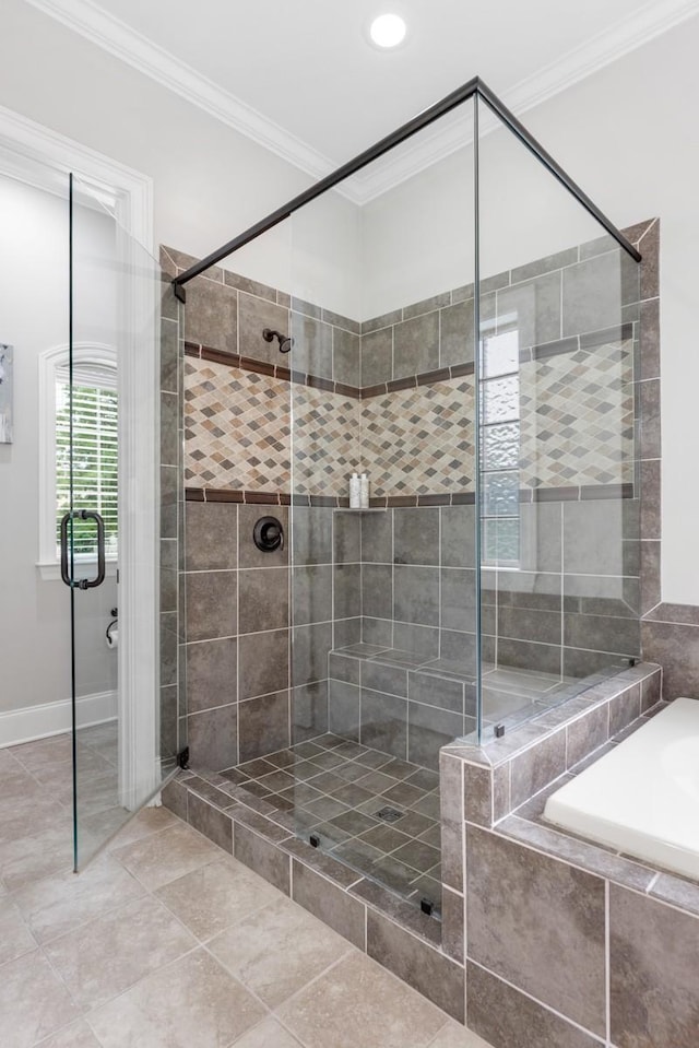 1237 Potter Ln, Gallatin, TN 37066 - full bathroom featuring a shower stall, a bath, crown molding, tile patterned floors, and baseboards